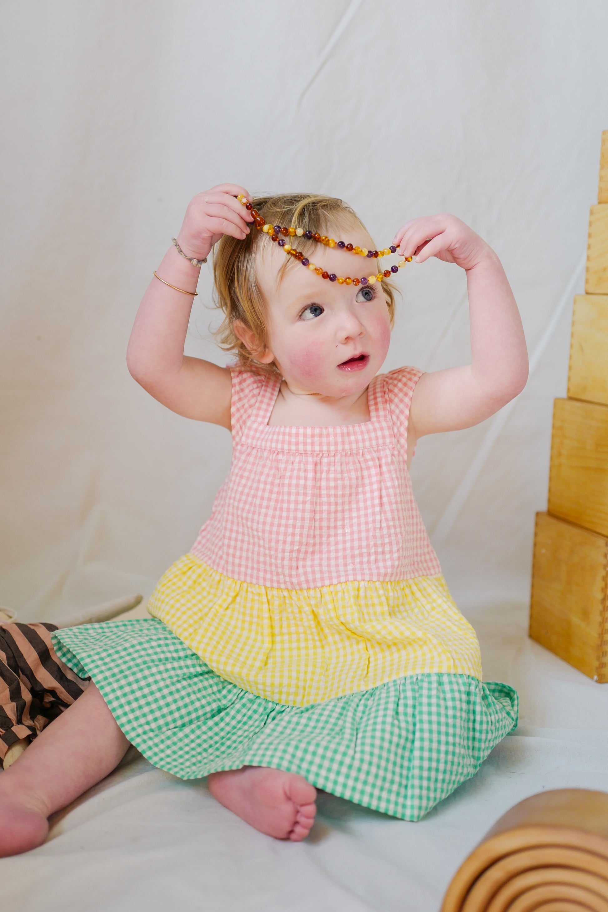 Poplin dress with a multi-colored checkered design